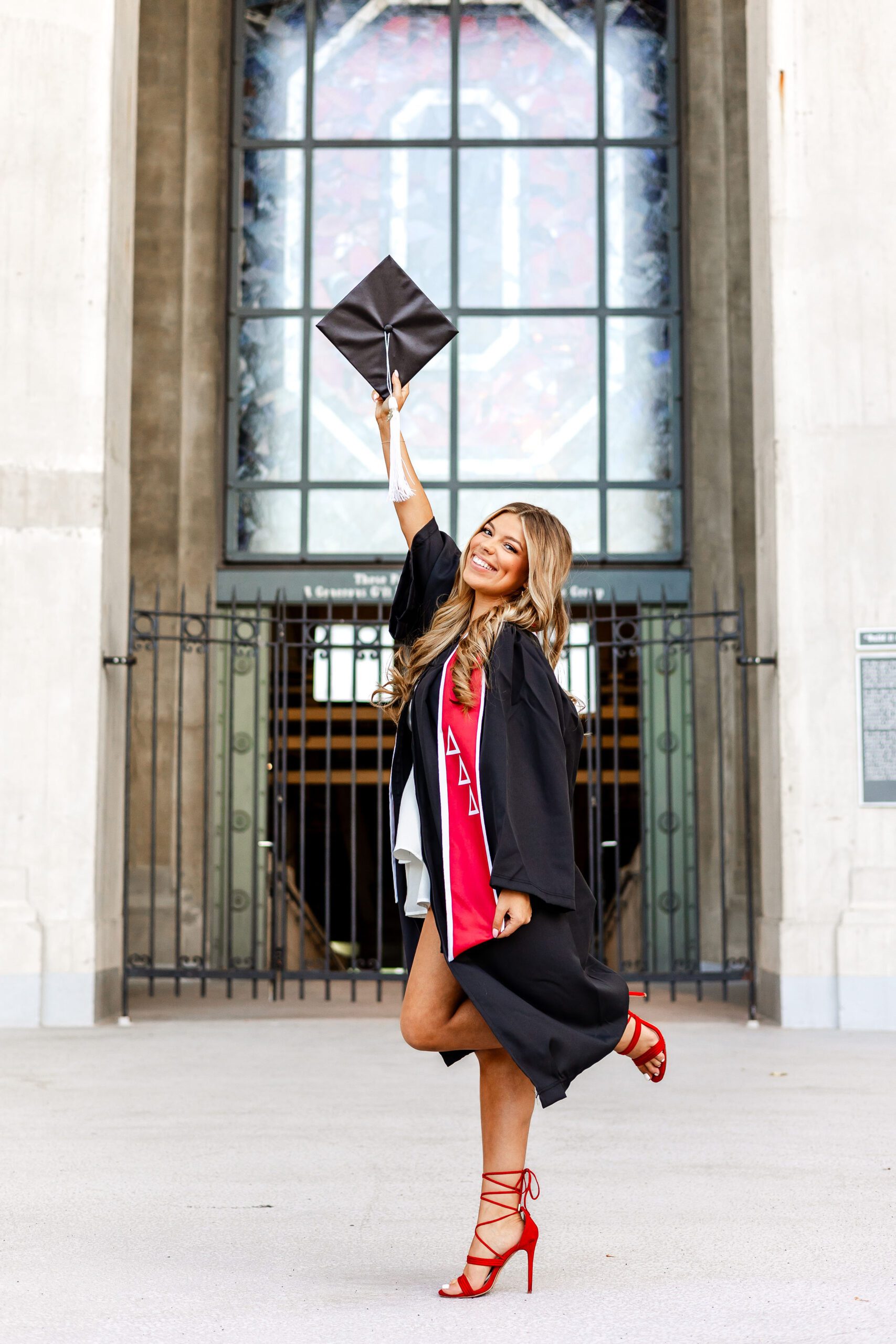 OSU senior in cap and gown 